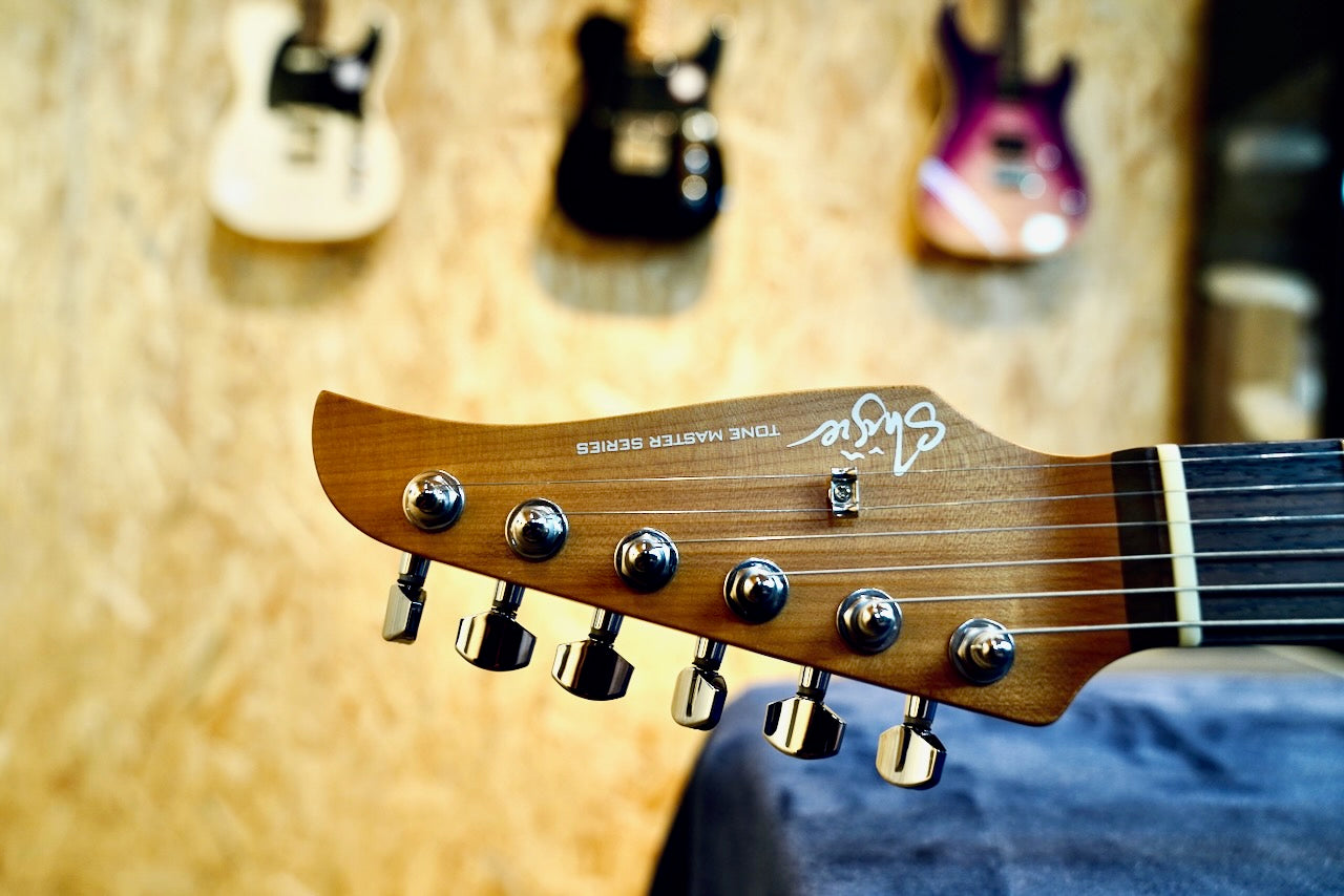 Shijie TM4 - 2025 - Metallic Black - Headstock 2